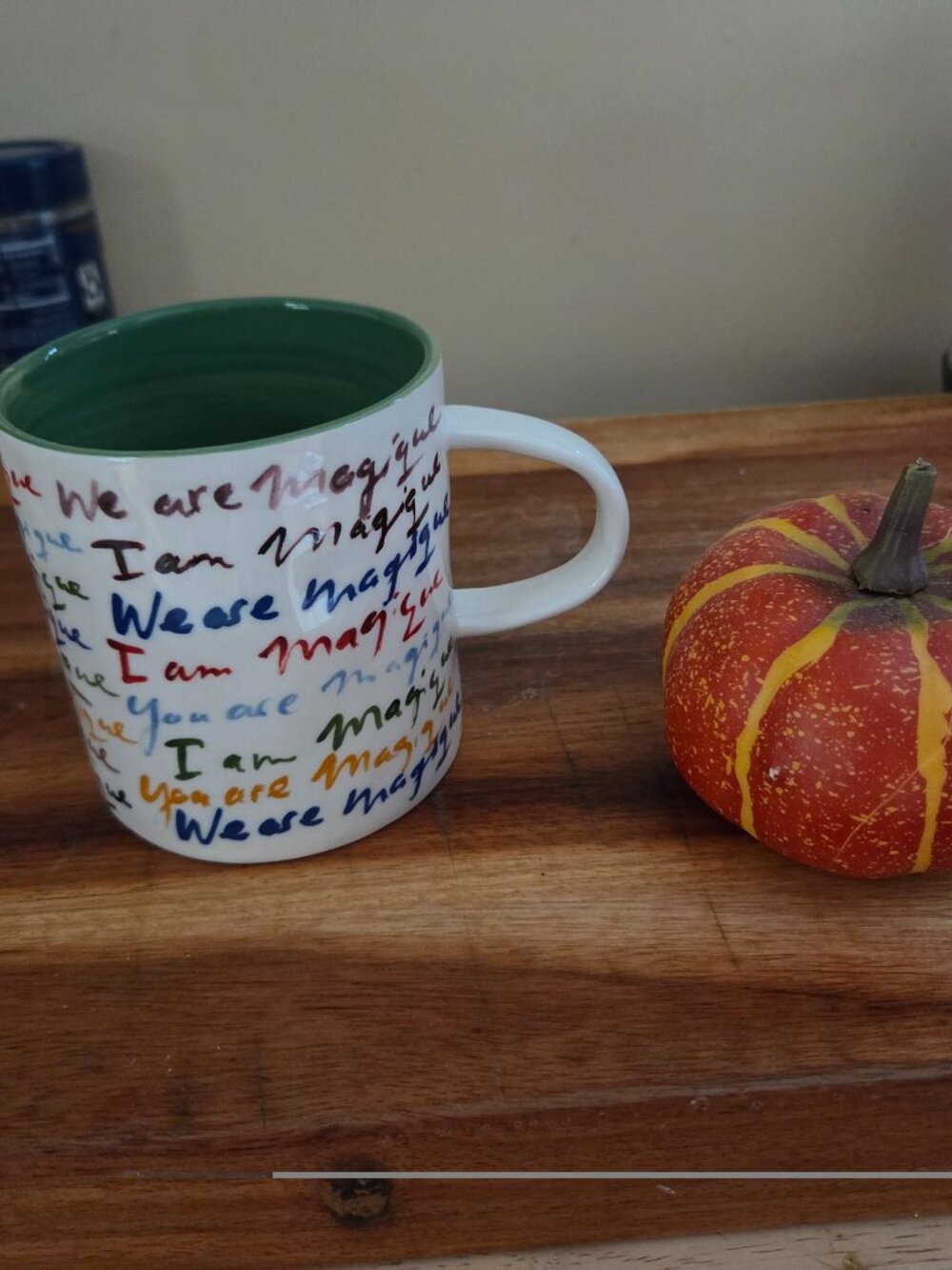 ceramic mug green interior empowering phrases written all over by anthropologies